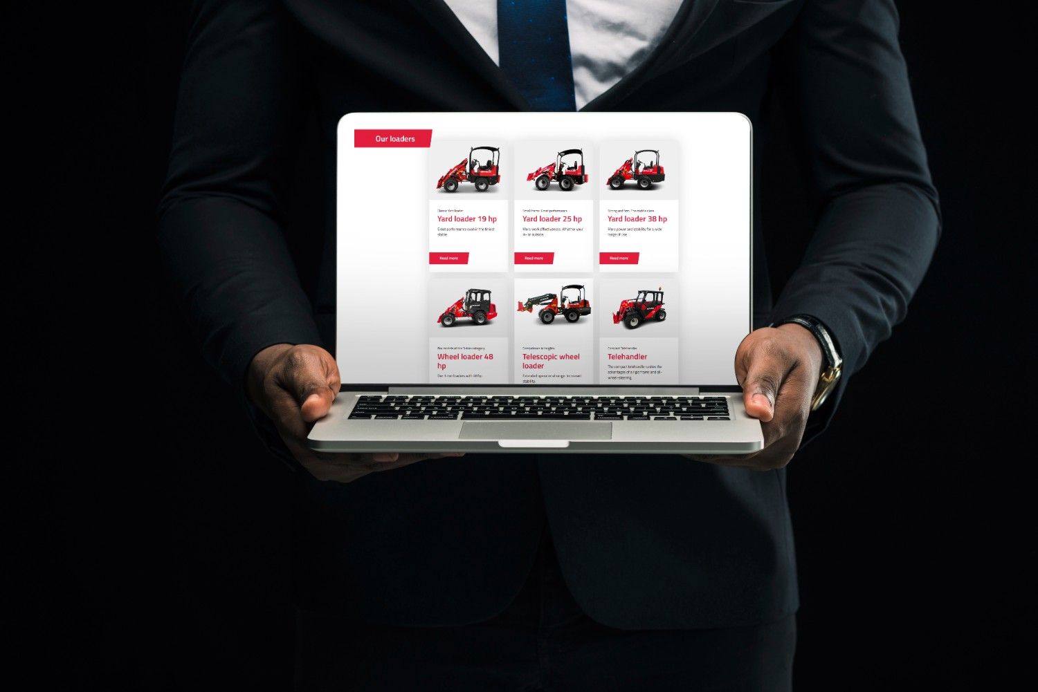 ethnic-businessman-showing-laptop (1)
